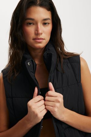 The Mother Puffer Quilted Vest